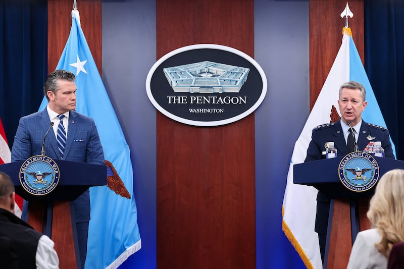 U.S. Secretary of Defense Pete Hegseth and Chairman of the Joint Chiefs of Staff Air Force General Dan Caine hold a press briefing in the Pentagon Press briefing room, following the announcement of a two-week ceasefire in the Iran war, at the Pentagon in Washington, D.C., U.S., April 8, 2026. REUTERS/Kevin Lamarque