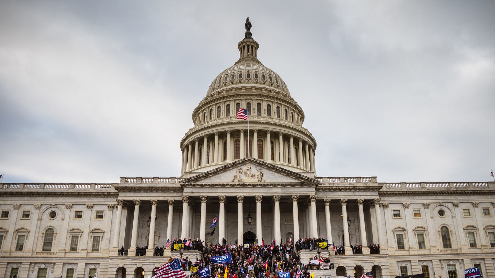 A large group of pro-Trump protesters stand on the East steps of the Capitol Building after storming its grounds on January 6, 2021 in Washington, DC.