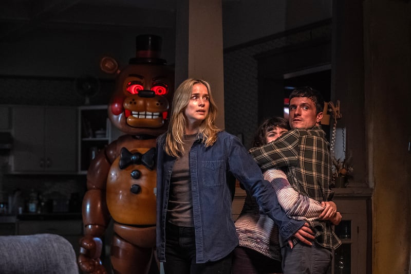 (from left) Toy Freddy, Elizabeth Lail, Piper Rubio, and Josh Hutcherson in Five Nights at Freddy’s 2.